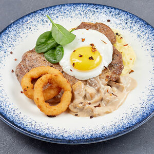 Отбивная из свинины с грибами с картофельным пюре