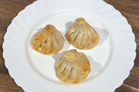 Жареные хинкали с бараниной