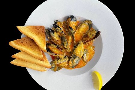 Мидии в соусе