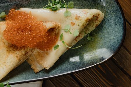 Блины с красной икрой лосося