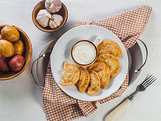 Вареники с картофелем и грибами жареные