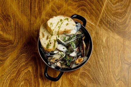 Мидии в соусе Пармезан