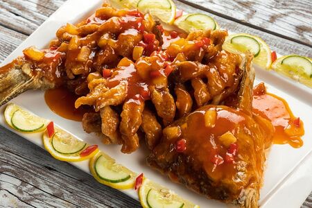 Карп в кисло-сладком соусе