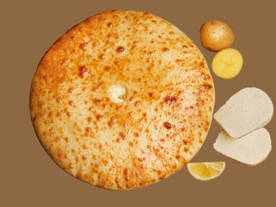 Осетинский пирог с мясом, капустой и сыром 