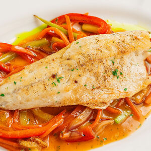 Сибас на овощной подушке