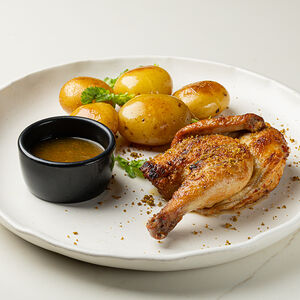 Половина цыпленка в аджике