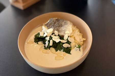 Мурманская треска с птитимом и сливочным соусом понзу