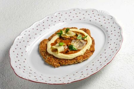 Шницель по-милански