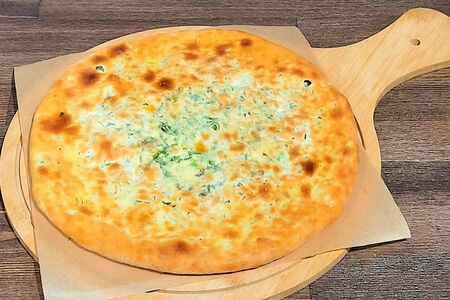 Осетинский пирог с зеленью и сыром