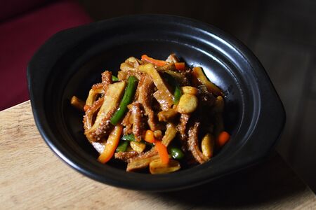 Говяжий желудок с чесноком