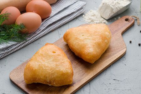 Пирожки жареные с луком и яйцом