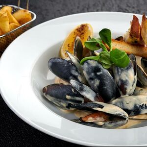 Мидии по-французски