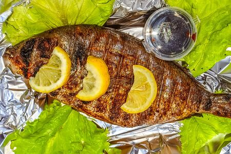 Дорадо на мангале