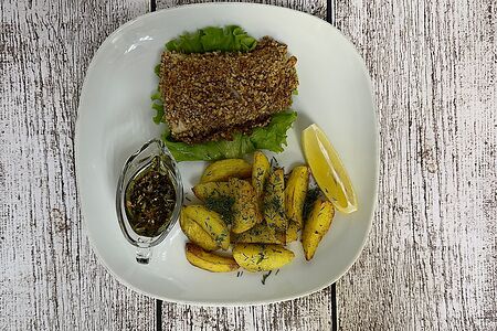 Судак в грецких орехах и цедре