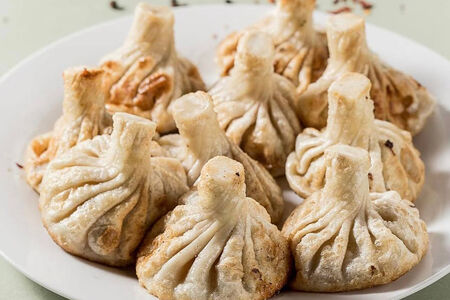 Жареные хинкали чкмерули