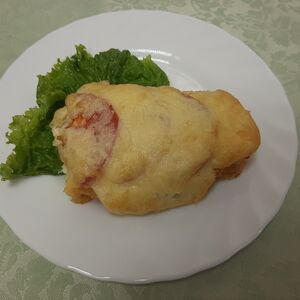 Филе минтая, запеченное с помидором