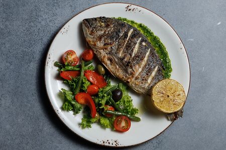 Дорадо с овощным гарниром