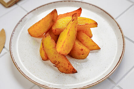 Запеченные картофельные дольки