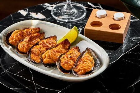 Запечённые мидии в сырном соусе