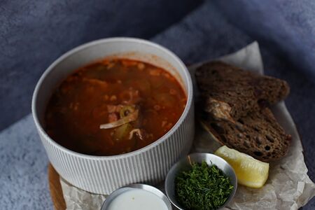 Солянка мясная сборная со сметаной