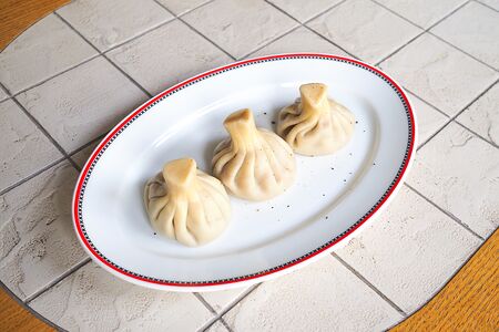 Хинкали с сыром и зеленью вареные