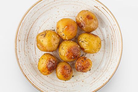 Картофель молодой, запечённый с травами