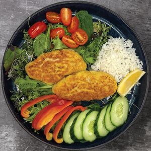 Котлетки из судака с рисом, овощами и зеленью