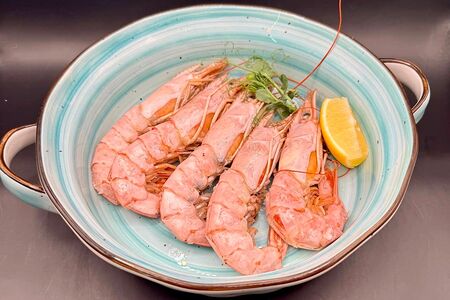 Лангустины в соусе на выбор