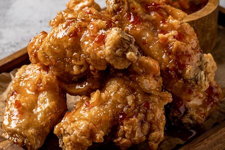 Куриные крылья в кисло-сладком соусе