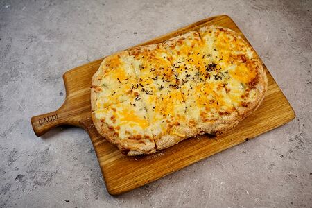 Пицца Четыре сыра и черный трюфель