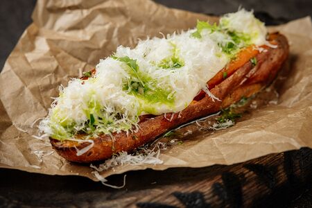 Запеченный на углях батат с соусом дорблю и чимичурри