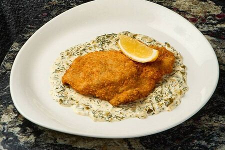 Шницель из свинины с соусом тартар