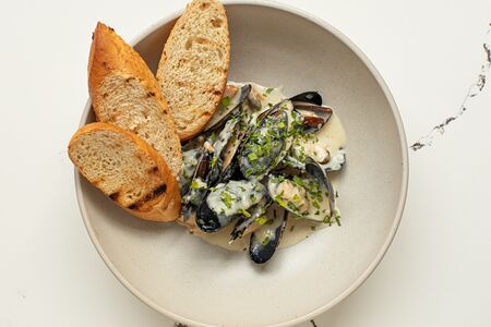 Мидии в соусе Дорблю