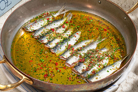 Сардины, запечённые с травами