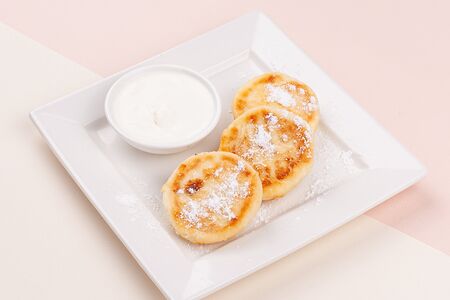 Сырники со сметаной