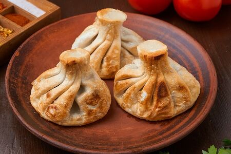 Хинкали с грибами жареные