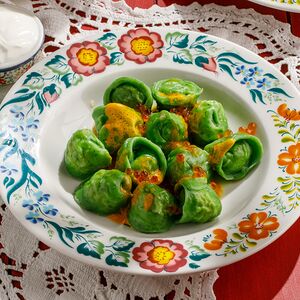 Пельмени с Ладожской щукой и сливочным соусом