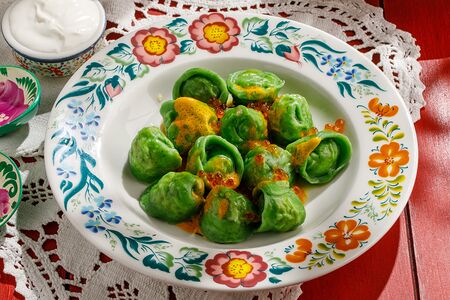 Пельмени с Ладожской щукой и сливочным соусом