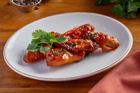 Куриные крылья в кисло-сладком соусе