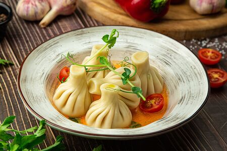 Мини-хинкали с креветками в соусе Том ям