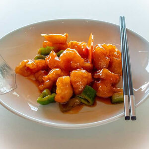 Свинина с ананасами в кисло-сладком соусе