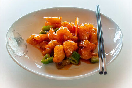 Свинина с ананасами в кисло-сладком соусе