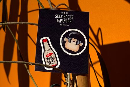 Фирменный стикер