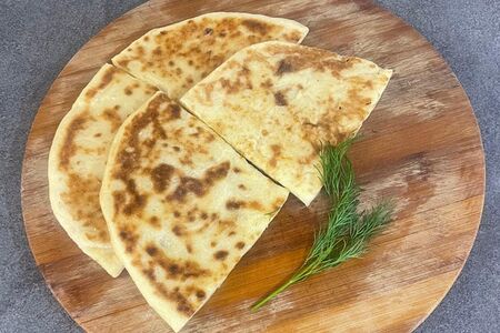 Хычин печеный с картофелем и сыром