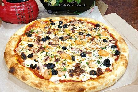 Пицца с морепродуктами 