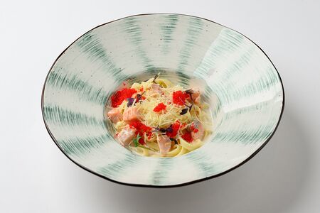 Тальятелле с семгой и икрой летучей рыбы