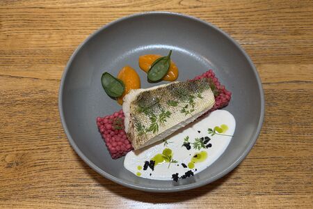 Судак со свекольным птитимом, муссом из тыквы и розмариновым соусом