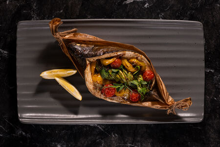 Форель запеченая с овощами