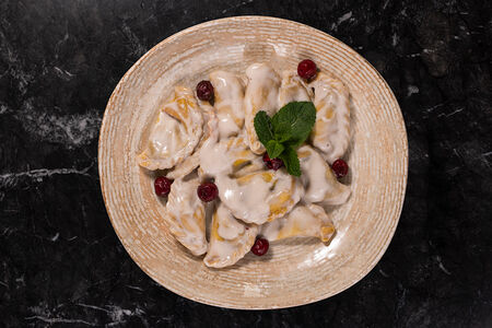 Вареники с вишней, свареные в ягодном морсе