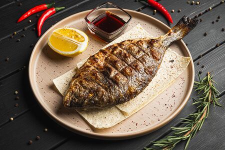 Дорадо на мангале